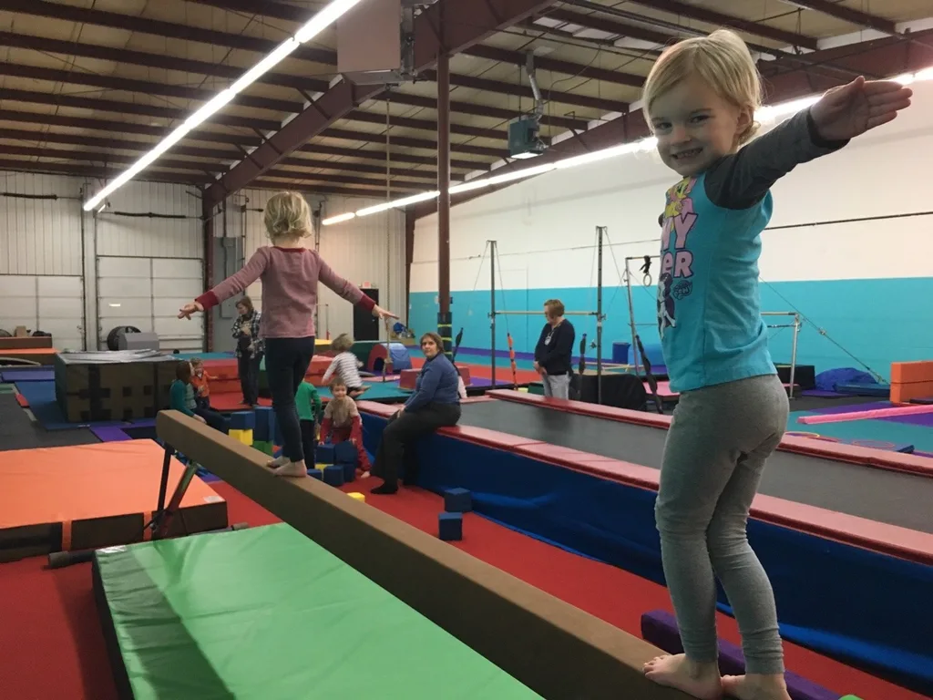 The girls love that our preschool playgroup keeps meeting at Gym Skills.