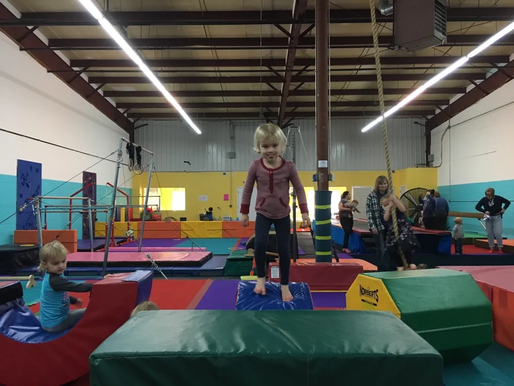 The girls love that our preschool playgroup keeps meeting at Gym Skills.