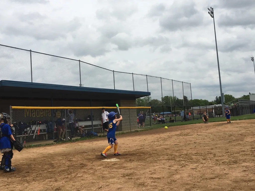 Abby had two at bats, scored two points, and had a really good time at her first softball game!