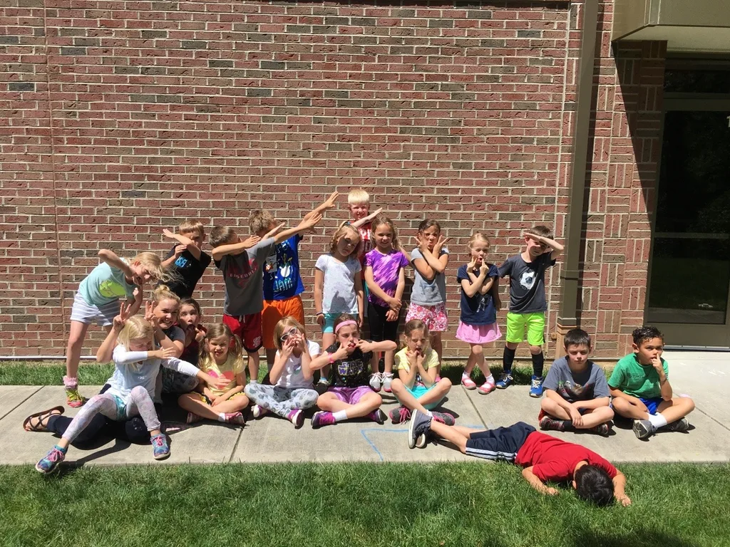 I somehow forgot to post the pictures from Abby’s end of the school year class party. Gwen, Josie, and I brought and served the very popular ice cream sundaes.