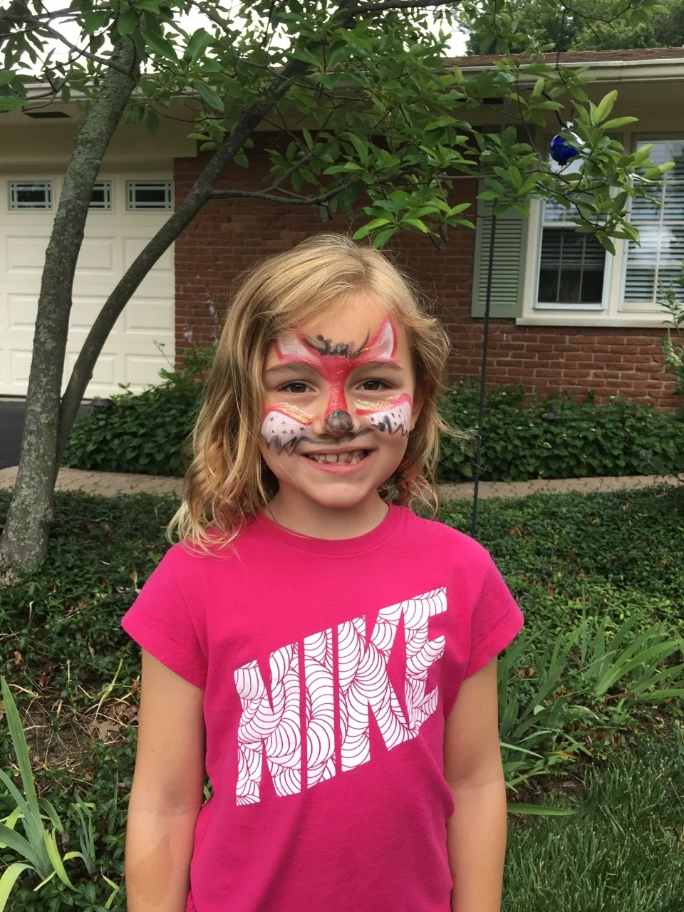 These girls are really excited about Grandpa having a new face painting kit (with glitter).
