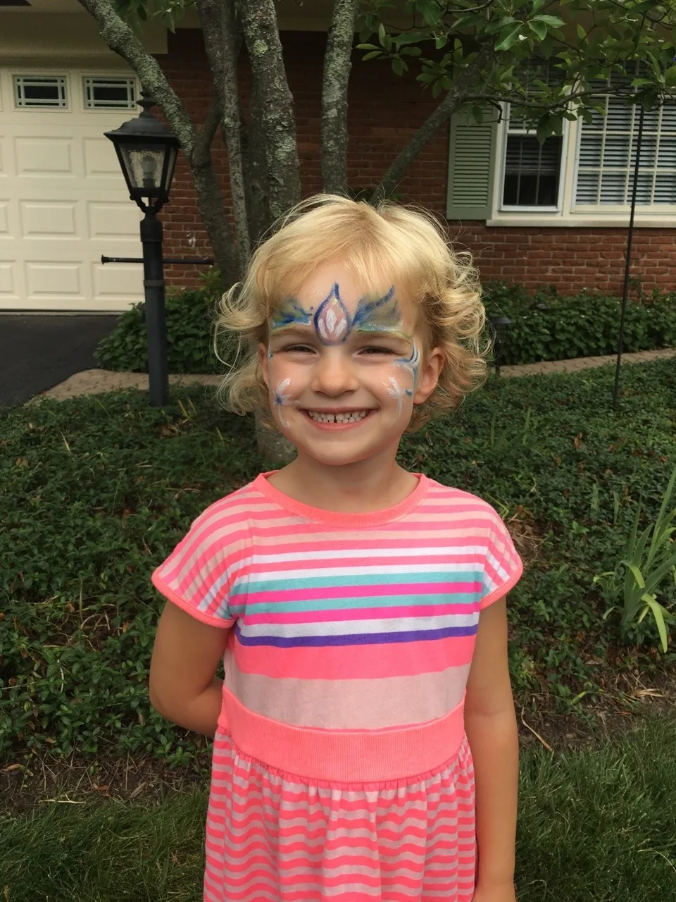 These girls are really excited about Grandpa having a new face painting kit (with glitter).
