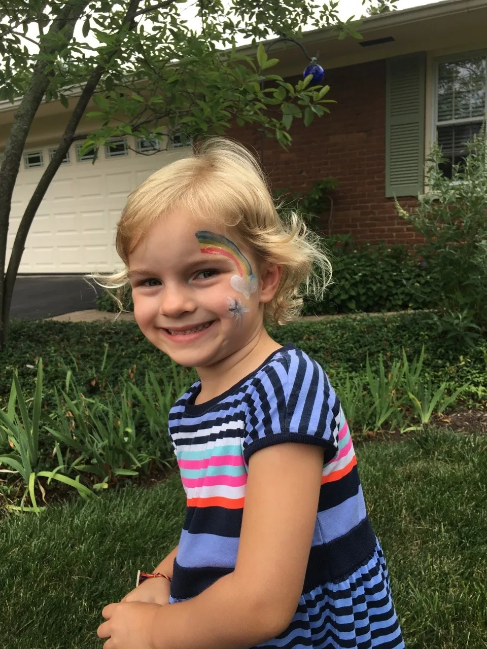 These girls are really excited about Grandpa having a new face painting kit (with glitter).