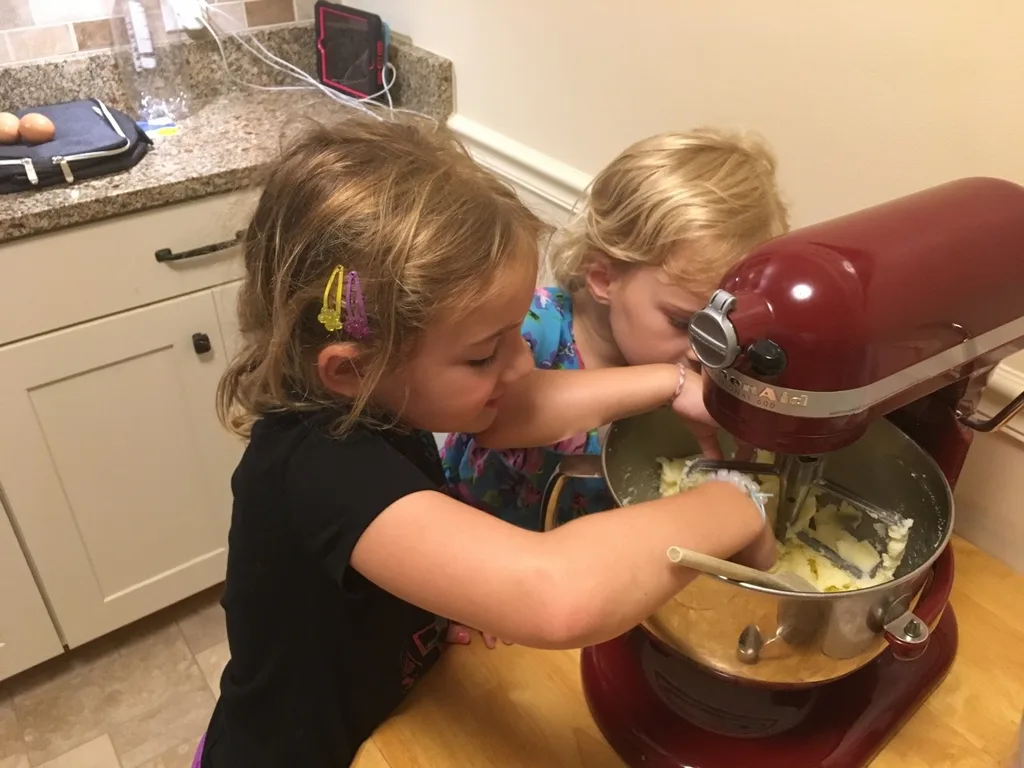 What do you do with three busy girls on a rainy day? You go bowling with friends, and reluctantly agree to a baking project that “you’re not allowed to help with.” Later you help clean up the mess.
