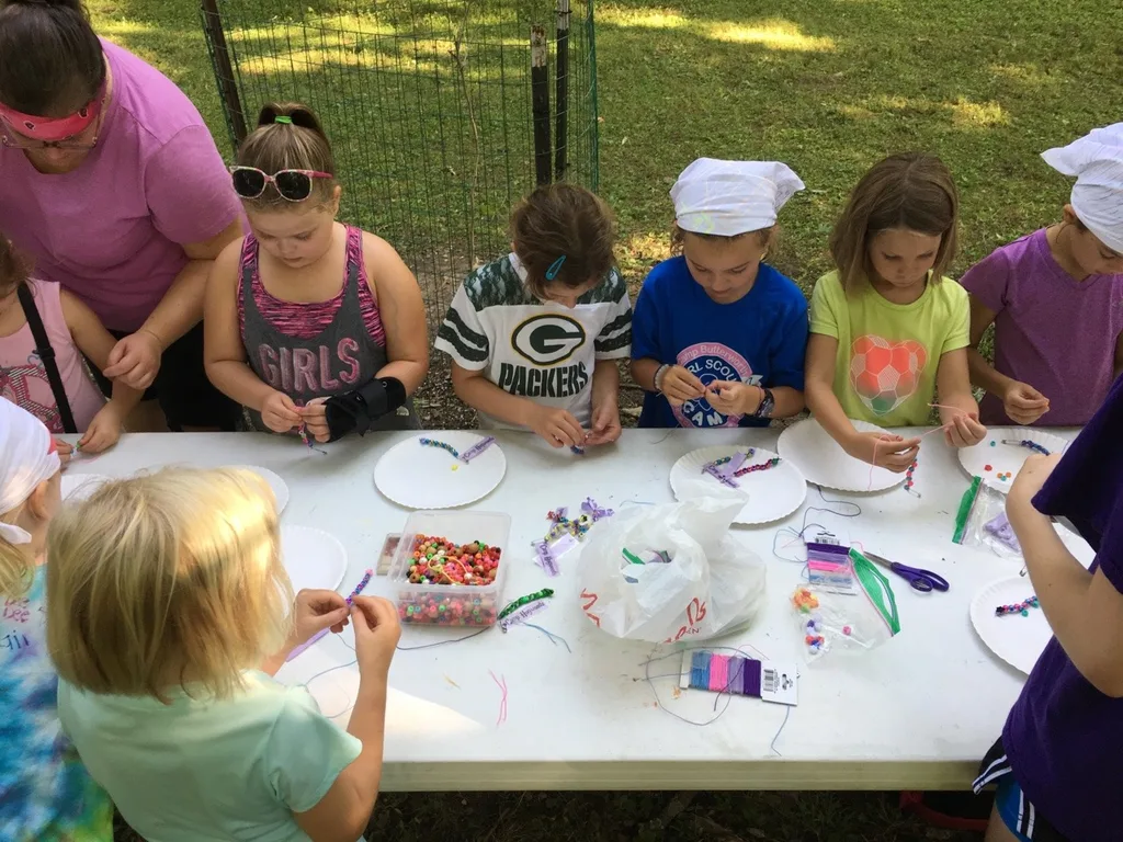 It’s unbelievable that tomorrow is already our halfway point for “Camp Hogwoods” Girl Scout Camp at French Park! So far, we’ve hiked, walked through the creek, played with clay, tie-dyed t-shirts, played games like Drip Drip Drench, watched a magic show, decorated banners and bandanas, performed friendship skits, sent PAs to Azkaban, gone on a scavenger hunt, visited with Zoo animals, made SWAPS, learned first aid skills, and more! It’s been a busy, but fun week.