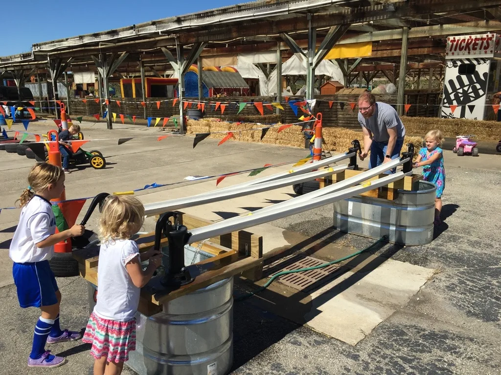 We visited two fall festivals at farms this weekend! Although we had fun at both, we all agreed that Shaw Farm is far superior to Burger Farm.