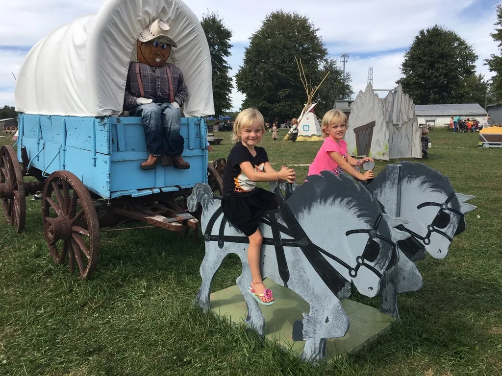 We visited two fall festivals at farms this weekend! Although we had fun at both, we all agreed that Shaw Farm is far superior to Burger Farm.