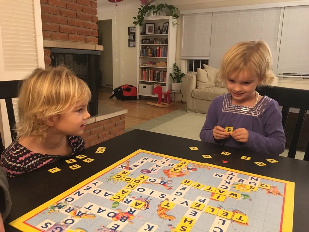 Gwen and Josie are big girls! First family Scrabble (Junior) game!
