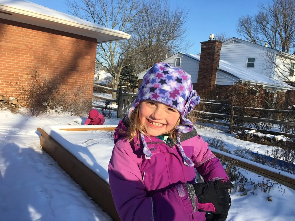 These silly girls were back outside to play in the snow at 9am!