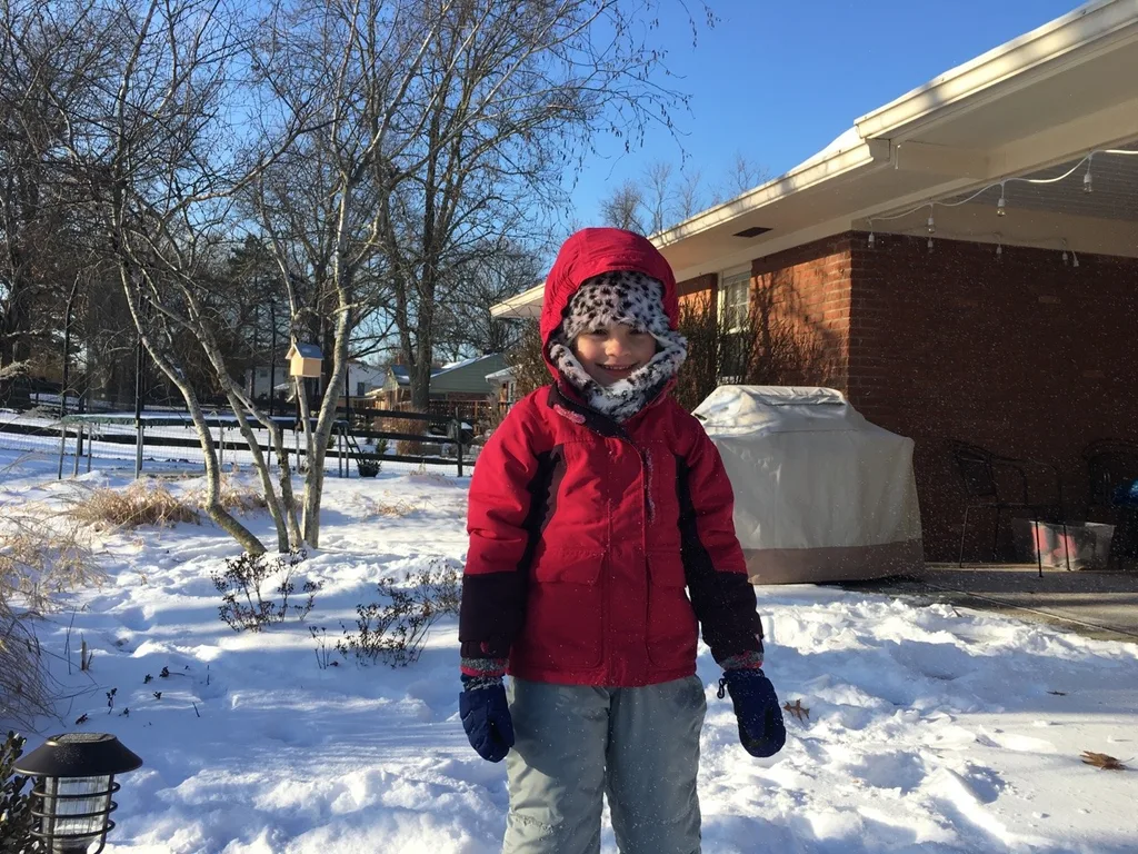 These silly girls were back outside to play in the snow at 9am!
