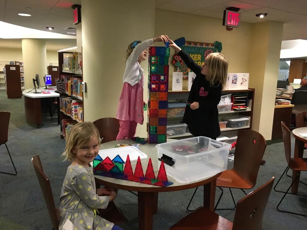 They finally have a friend at storytime (Edie) and are very interested in reading and building tall towers.