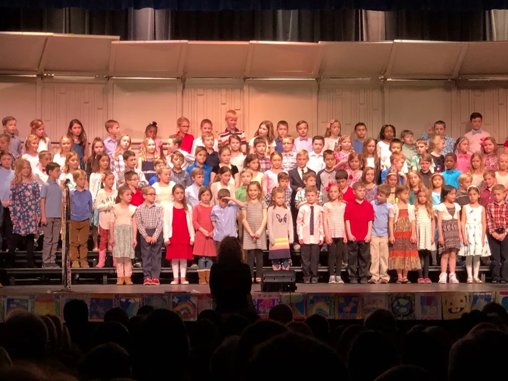 Second grade musical “Friendship, Kindness, and Love” (Abby is in the 3rd row, 3rd from left)