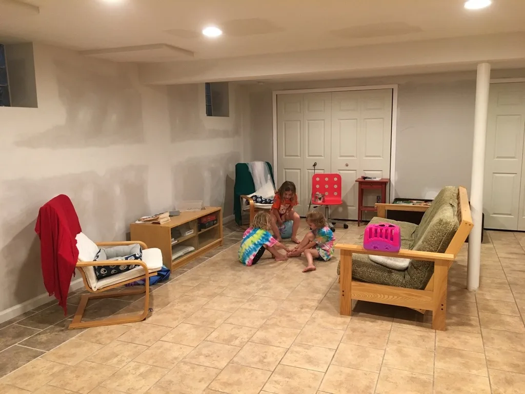 It still needs to be painted, but after four weeks our basement looks so much nicer!