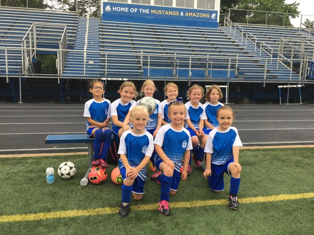 Last soccer game of the season was a tie, and Abby scored a goal!