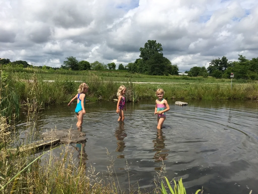 The girls swam in water other than a swimming pool for the first time today at Stella and Ruby’s house, and they loved it! Gwen was unsure of the muddy bottom, but she did finally jump in with everyone else. Josie freaked out when the dogs or goats got too close, but didn’t blink an eye at swimming with frogs and turtles. Abby is part farm girl. She loved everything!