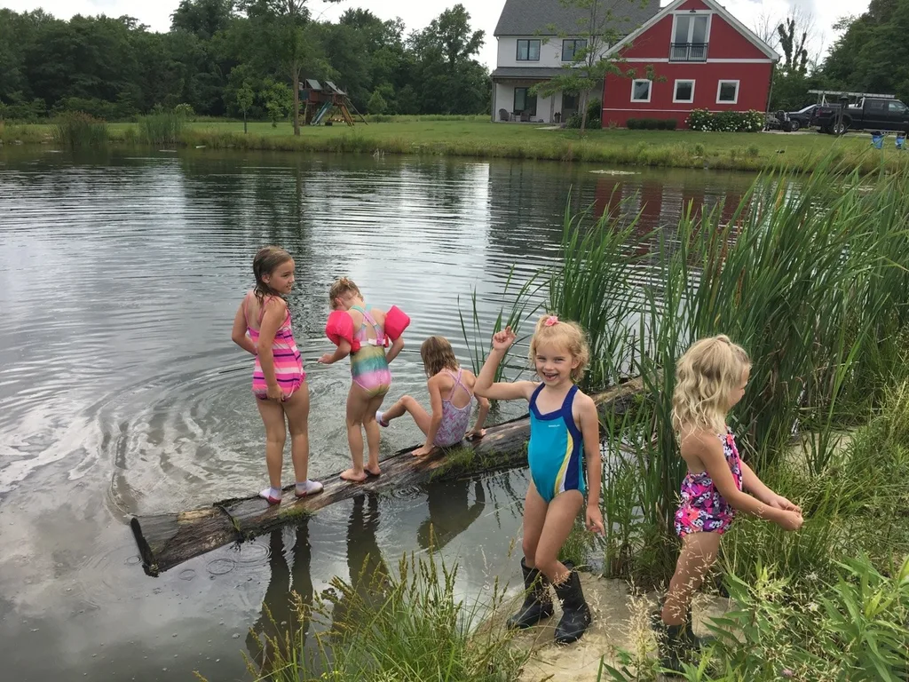 The girls swam in water other than a swimming pool for the first time today at Stella and Ruby’s house, and they loved it! Gwen was unsure of the muddy bottom, but she did finally jump in with everyone else. Josie freaked out when the dogs or goats got too close, but didn’t blink an eye at swimming with frogs and turtles. Abby is part farm girl. She loved everything!
