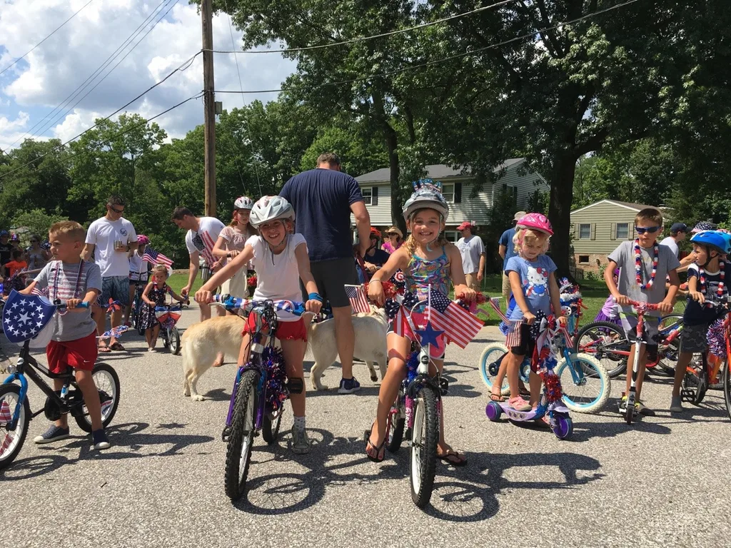 Fourth of July in Kenwood Hills! Josie ate way too much cotton candy, Abby enthusiastically helped with concessions, and Gwen dove for the rocket in the deep end until nine. Another fun neighborhood parade and party!