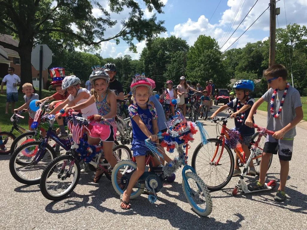 Fourth of July in Kenwood Hills! Josie ate way too much cotton candy, Abby enthusiastically helped with concessions, and Gwen dove for the rocket in the deep end until nine. Another fun neighborhood parade and party!
