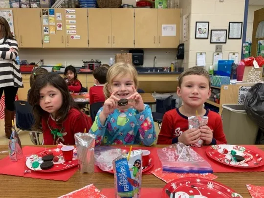The girls enjoyed their kindergarten class holiday party, but were sad that it was their last day with their nice substitute teacher, Ms. Longwell.