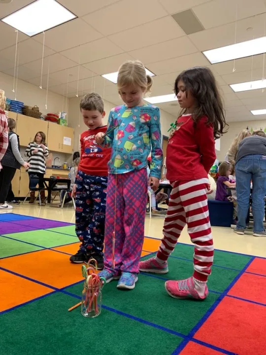 The girls enjoyed their kindergarten class holiday party, but were sad that it was their last day with their nice substitute teacher, Ms. Longwell.