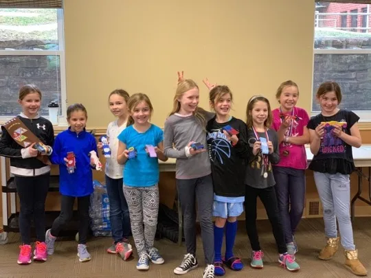Josie’s sparkly birthday cake racer came in first place in our Daisy race of the 2019 Madeira Scouts Pinewood Derby! Abby’s Ravenclaw racer and Gwen’s rocket were both cool cars, but not quite fast enough to win (6th place).