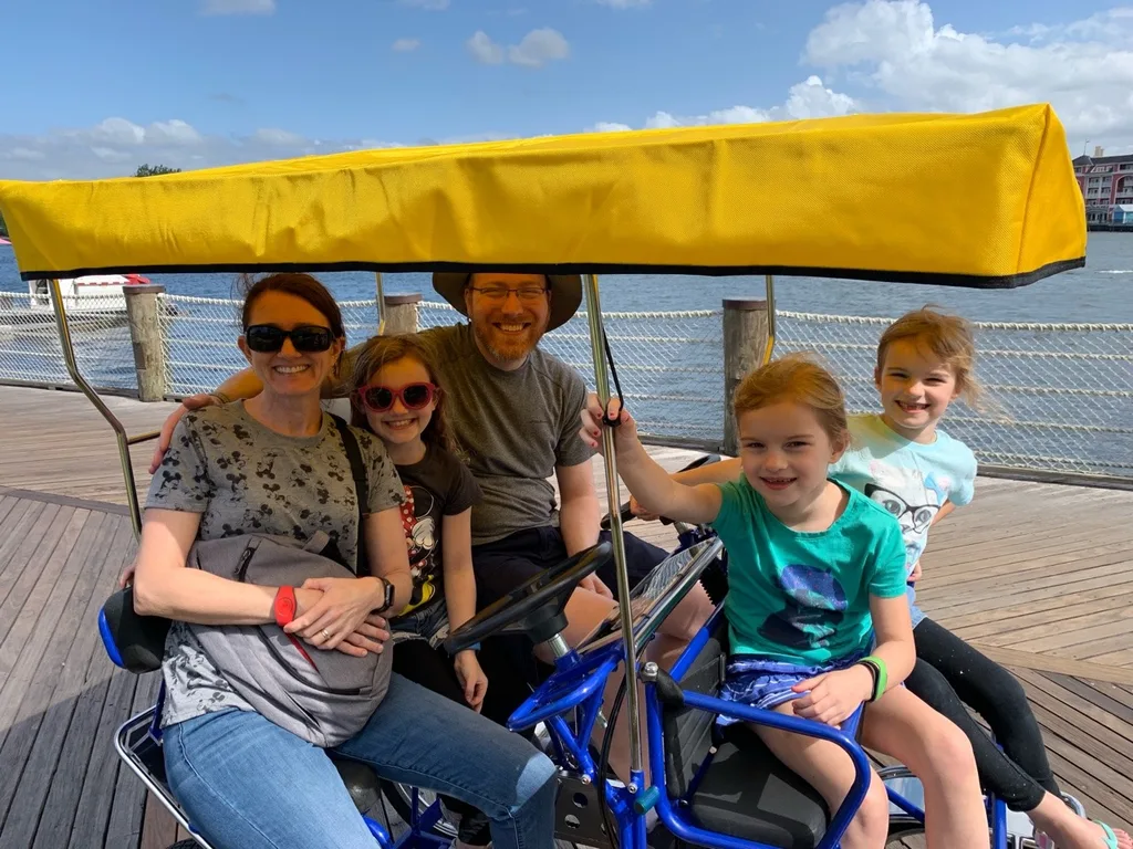 Our “restful” resort day at Disney included a thunderstorm, high winds, and cooler temps. We still enjoyed some arcade fun, lunch at Disney Springs, a surrey bike ride around the Boardwalk, swimming, a boat ride, and entertaining shows on the Boardwalk. Thank goodness the pools are heated!