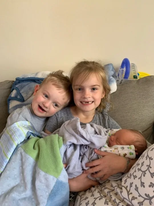 Gwen and Josie loved holding baby Nickolas James.