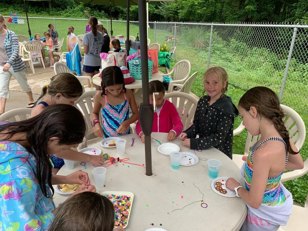 Cool and rainy, but these Junior Girl Scouts still had fun! Lots of swimming, SWAPS, slime, and pizza. Of course, the sun came out five minutes after the party ended!