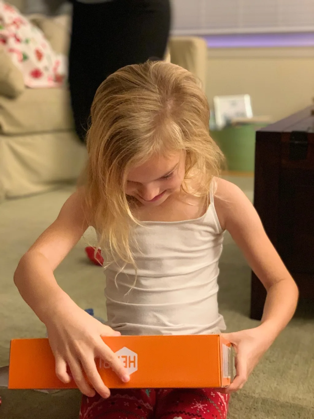 Abby tried to stay up to catch Santa; no luck. Christmas morning featured lots of fun new toys for our maker space.