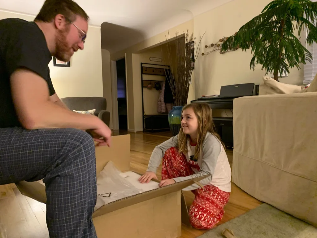 Abby tried to stay up to catch Santa; no luck. Christmas morning featured lots of fun new toys for our maker space.