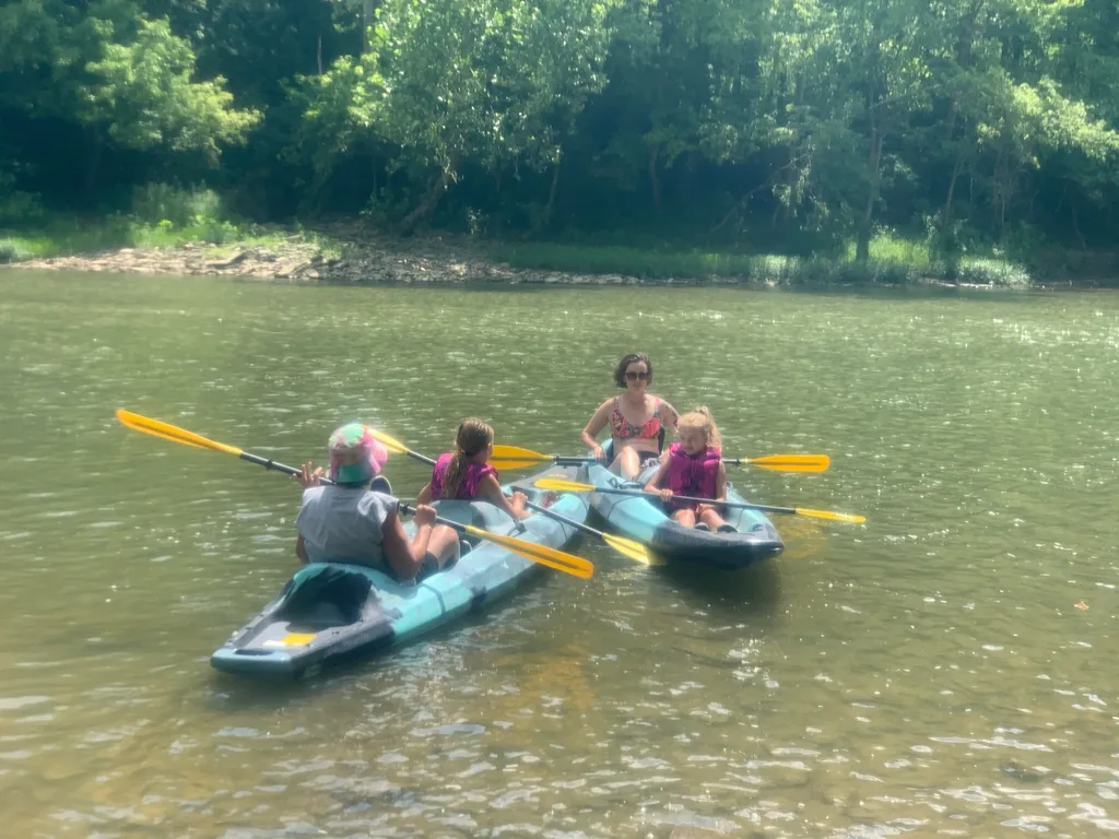Today felt like a vacation! We went kayaking (five miles!) for the first time, and the girls loved it! Josie and Gwen took to it right away. Gwen initially freaked out about the “rapids” but eventually came around and even helped us get unstuck from a rapid by the end of our adventure.