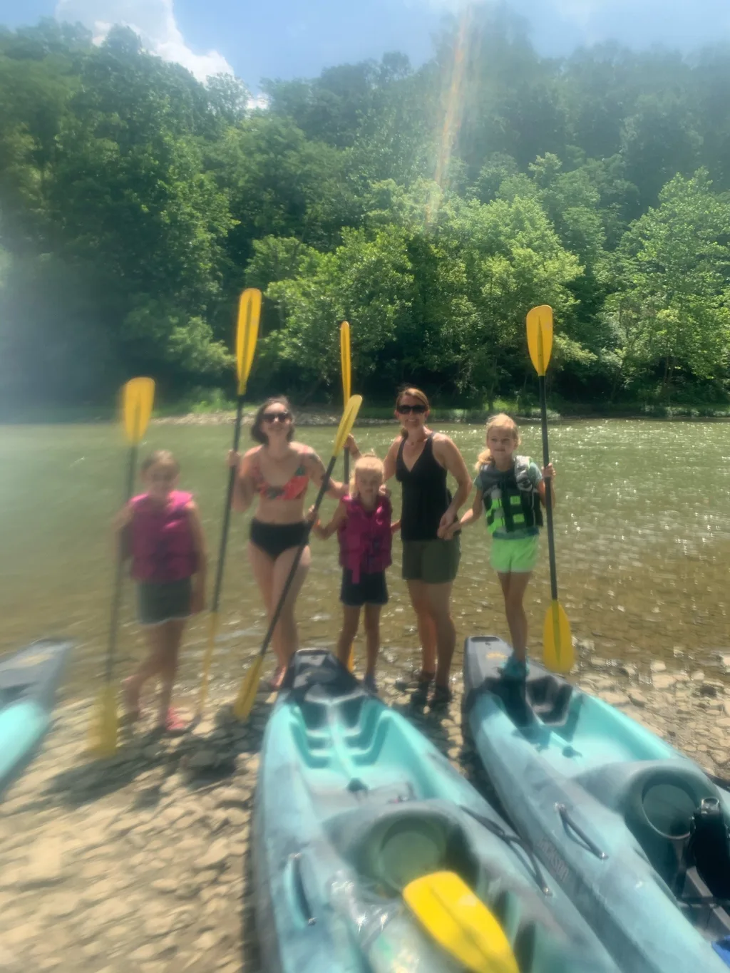 Today felt like a vacation! We went kayaking (five miles!) for the first time, and the girls loved it! Josie and Gwen took to it right away. Gwen initially freaked out about the “rapids” but eventually came around and even helped us get unstuck from a rapid by the end of our adventure.