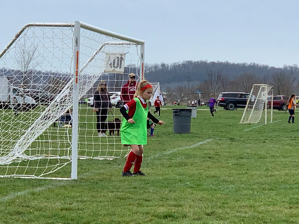 First club soccer games, part of a tournament weekend. First game was a 2-2 tie in the early morning fog. Girls fought hard in the second game, but lost. Daisy loved meeting everyone.