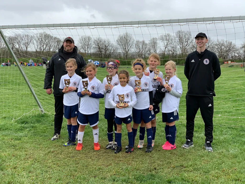 Kolping Memorial Tournament finalists: just for the 2012 players, no subs, rain, and still the girls won their first three games! Lost the final, but still proudly received trophies.
