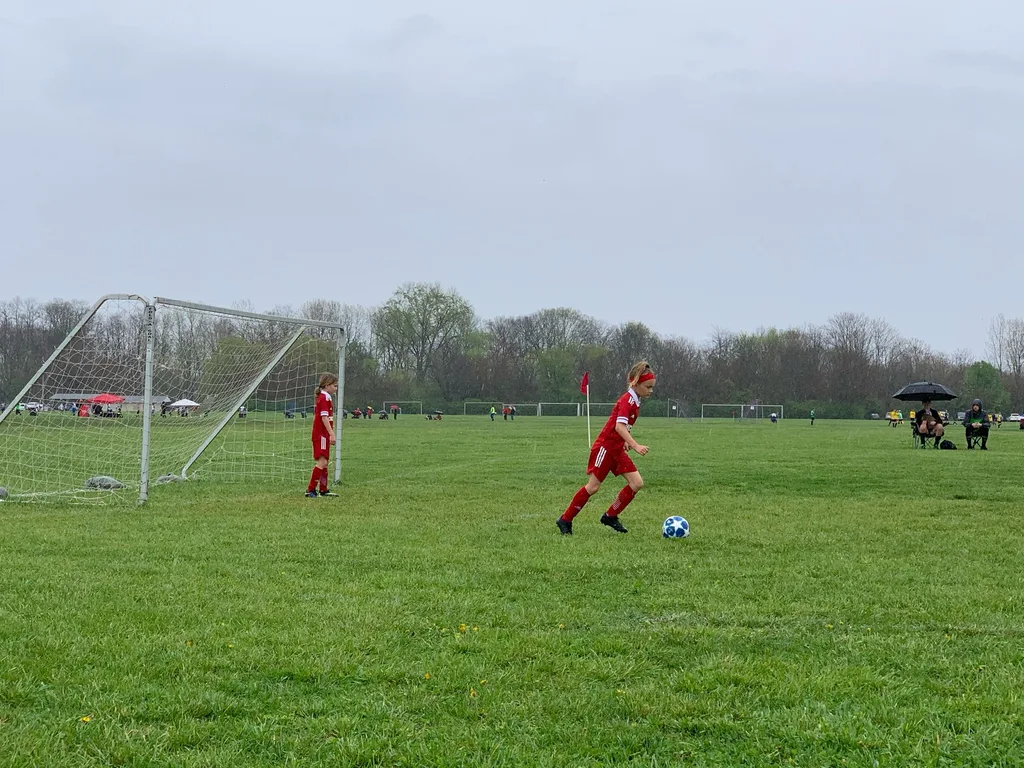 Kolping Memorial Tournament finalists: just for the 2012 players, no subs, rain, and still the girls won their first three games! Lost the final, but still proudly received trophies.