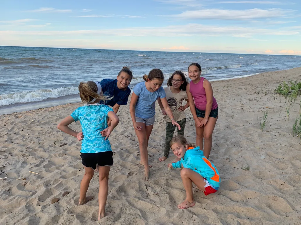 We had the best time celebrating the Fourth of July with the Sammut Family at their Harbor Beach Michigan lake house. We swam, kayaked, walked the long stretches of sandy beach, helped them break in their brand new jet ski and “private island” float, enjoyed family dinners, roasted s’mores, played games, taught Daisy to retrieve balls from the lake, hunted for lake treasures, played games, and more! The girls said these were there favorite things: jet skiing (Gwen), everything (Josie), and performing skits on the beach with Bella and Sophie l (Abby). Gwen summarized the way we all felt “best vacation ever!”