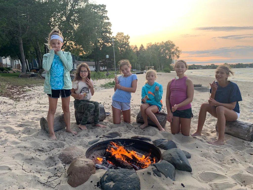 We had the best time celebrating the Fourth of July with the Sammut Family at their Harbor Beach Michigan lake house. We swam, kayaked, walked the long stretches of sandy beach, helped them break in their brand new jet ski and “private island” float, enjoyed family dinners, roasted s’mores, played games, taught Daisy to retrieve balls from the lake, hunted for lake treasures, played games, and more! The girls said these were there favorite things: jet skiing (Gwen), everything (Josie), and performing skits on the beach with Bella and Sophie l (Abby). Gwen summarized the way we all felt “best vacation ever!”