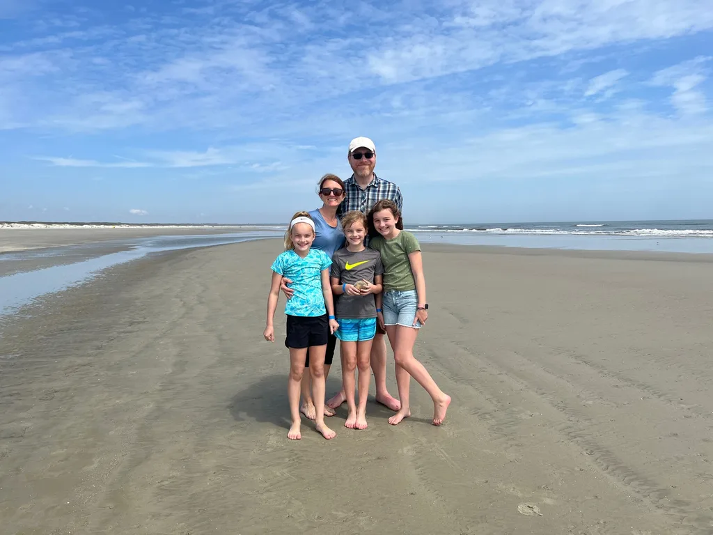 Cumberland Island 2022 vs. 2016 was so much better! By visiting in March instead of August, we were already likely to have a nicer time, and we did! We hiked over four miles, saw all of the major sites, and had a blast in the ocean. Everyone loved hunting for (stinky) shells on the desolate ocean side, seeing wild horses on the beach, and exploring the ruins. We missed seeing manatees at the dock this time, but loved the ferry boat ride (esp. Gwen) and seeing dolphins.