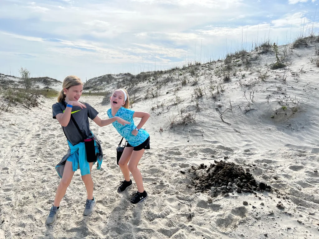Cumberland Island 2022 vs. 2016 was so much better! By visiting in March instead of August, we were already likely to have a nicer time, and we did! We hiked over four miles, saw all of the major sites, and had a blast in the ocean. Everyone loved hunting for (stinky) shells on the desolate ocean side, seeing wild horses on the beach, and exploring the ruins. We missed seeing manatees at the dock this time, but loved the ferry boat ride (esp. Gwen) and seeing dolphins.