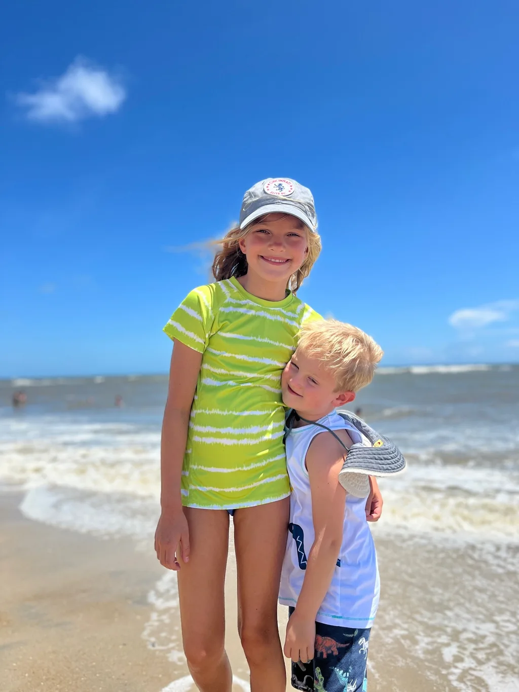 What an amazing trip to the OBX! We stayed in Salvo, one of the villages in the Cape Hatteras National Seashore. We all agreed we couldn’t have picked a better spot. The natural beauty of this place was incredible. I was amazed by the stretches of road where you could experience both the ocean and the sound at once. The waves were intense and the rip tides were terrifying, but beach walks were so nice. We loved collecting shells, hunting ghost crabs, watching the sun rise and set, splashing in the pool, watching Daisy swim, and our many excursions. Tailgating on the vehicle ferry boat ride to Ocracoke was fun. We also enjoyed jet skiing and a dolphin boat cruise from Wanchese. Watching the kite boarders while enjoying dinner at Waterman’s was a fun experience too.