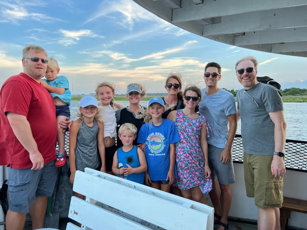 What an amazing trip to the OBX! We stayed in Salvo, one of the villages in the Cape Hatteras National Seashore. We all agreed we couldn’t have picked a better spot. The natural beauty of this place was incredible. I was amazed by the stretches of road where you could experience both the ocean and the sound at once. The waves were intense and the rip tides were terrifying, but beach walks were so nice. We loved collecting shells, hunting ghost crabs, watching the sun rise and set, splashing in the pool, watching Daisy swim, and our many excursions. Tailgating on the vehicle ferry boat ride to Ocracoke was fun. We also enjoyed jet skiing and a dolphin boat cruise from Wanchese. Watching the kite boarders while enjoying dinner at Waterman’s was a fun experience too.