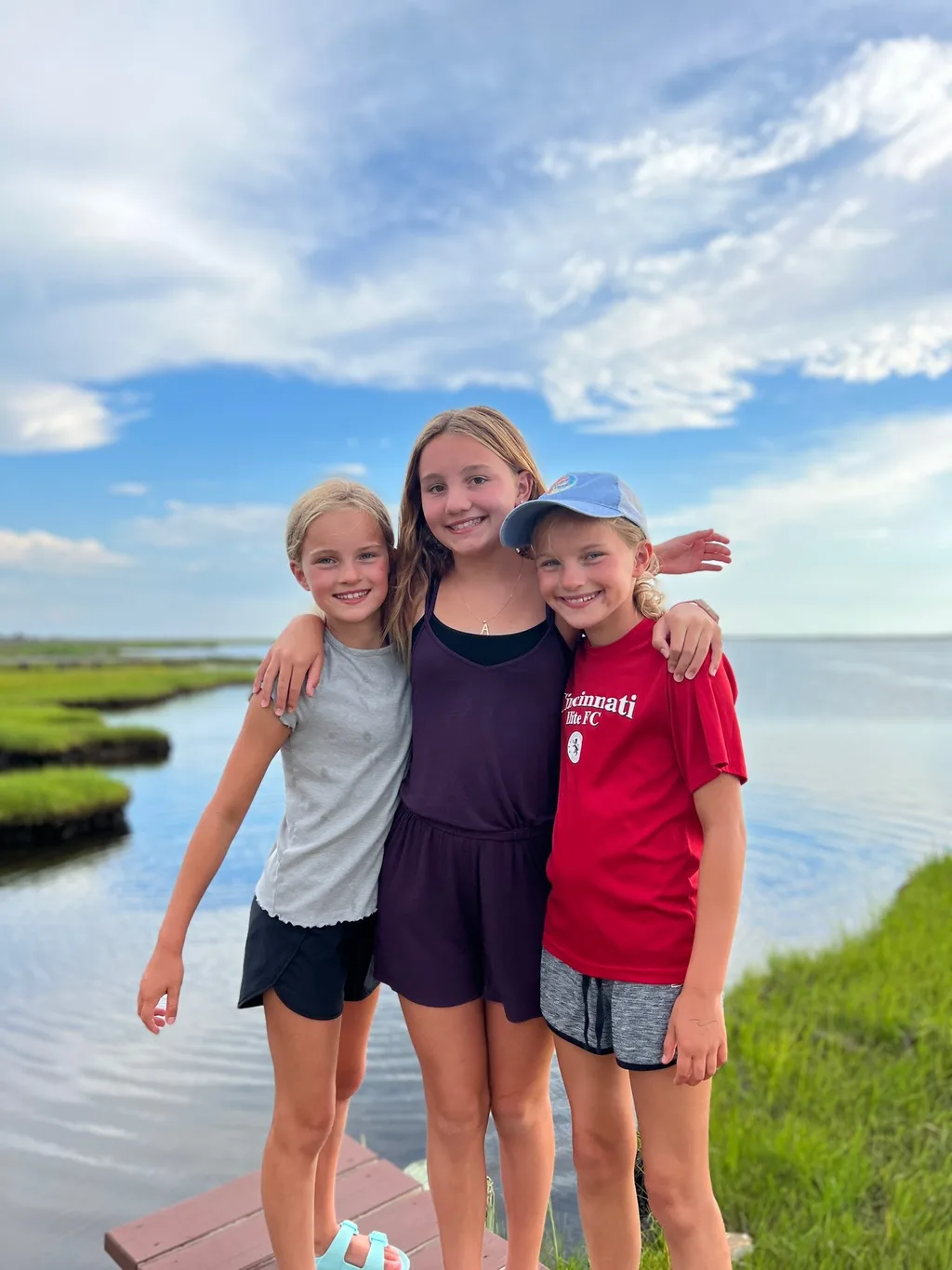 What an amazing trip to the OBX! We stayed in Salvo, one of the villages in the Cape Hatteras National Seashore. We all agreed we couldn’t have picked a better spot. The natural beauty of this place was incredible. I was amazed by the stretches of road where you could experience both the ocean and the sound at once. The waves were intense and the rip tides were terrifying, but beach walks were so nice. We loved collecting shells, hunting ghost crabs, watching the sun rise and set, splashing in the pool, watching Daisy swim, and our many excursions. Tailgating on the vehicle ferry boat ride to Ocracoke was fun. We also enjoyed jet skiing and a dolphin boat cruise from Wanchese. Watching the kite boarders while enjoying dinner at Waterman’s was a fun experience too.