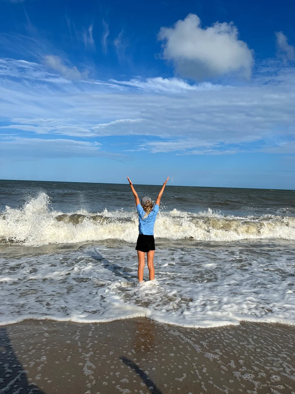 What an amazing trip to the OBX! We stayed in Salvo, one of the villages in the Cape Hatteras National Seashore. We all agreed we couldn’t have picked a better spot. The natural beauty of this place was incredible. I was amazed by the stretches of road where you could experience both the ocean and the sound at once. The waves were intense and the rip tides were terrifying, but beach walks were so nice. We loved collecting shells, hunting ghost crabs, watching the sun rise and set, splashing in the pool, watching Daisy swim, and our many excursions. Tailgating on the vehicle ferry boat ride to Ocracoke was fun. We also enjoyed jet skiing and a dolphin boat cruise from Wanchese. Watching the kite boarders while enjoying dinner at Waterman’s was a fun experience too.